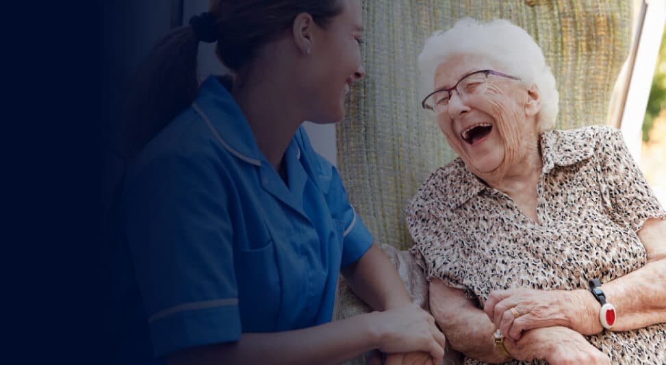 young woman taking care of elderly woman