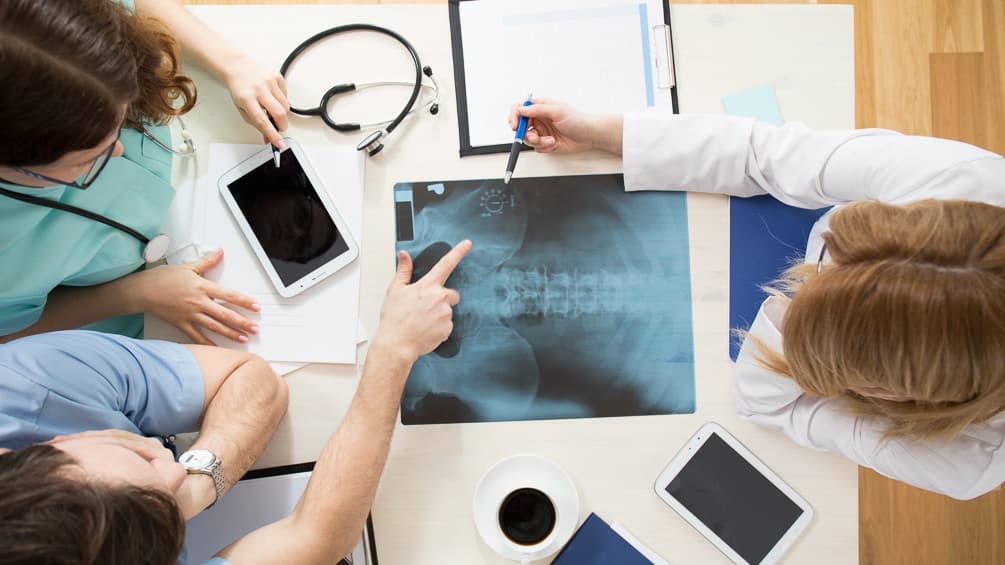 doctors examining xrays
