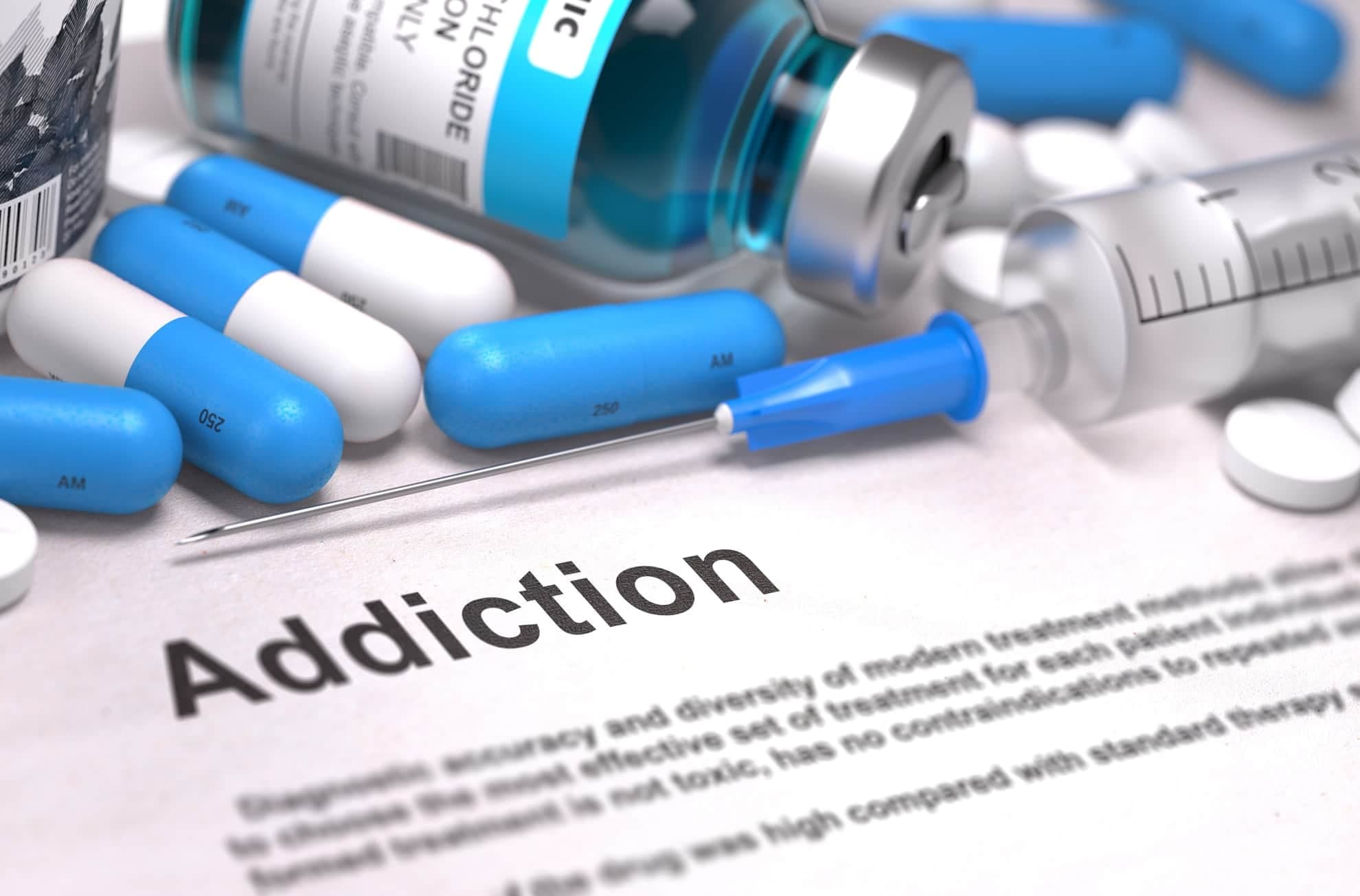 pills and needle