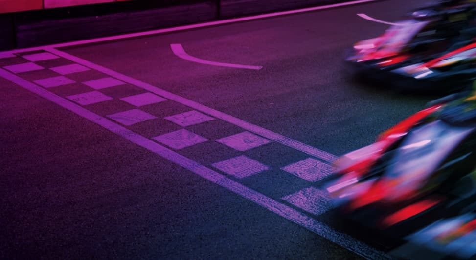 racecars at the finish line